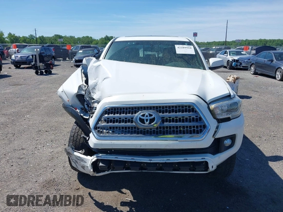 2016 Toyota Tacoma SR with VIN 3TMCZ5AN0GM003224, listed as a IAAI auction lot 42289910 with 140,899 mi miles and . Bid and sale history available at DreamBid. Image 12.