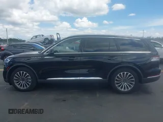 2021 Lincoln Aviator Reserve with VIN 5LM5J7WC0MGL12385, listed as a IAAI auction lot 42472422 with 20,404 mi miles and . Bid and sale history available at DreamBid. Image 14.