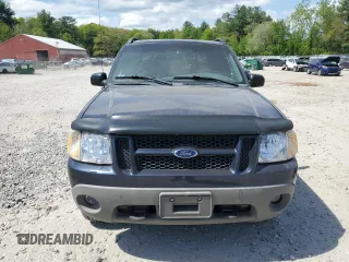 2001 Ford Explorer Sport Trac z VIN 1FMZU77E61UB01605, wystawiony jako Copart lot #56976175 z przebiegiem 106 313 mil mil oraz Tytuł czysty. Historia ofert i sprzedaży dostępna na DreamBid. Obrazek 5.