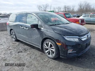 2018 Honda Odyssey Elite with VIN 5FNRL6H96JB079780, listed as a IAAI auction lot 41804787 with 62,861 mi miles. Bid and sale history available at carsss.com. Image 1.
