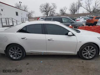 2013 Chevrolet Malibu LTZ with VIN 1G11H5SA7DF127467, listed as a IAAI auction lot 41192477 with 138,344 mi miles. Bid and sale history available at carsss.com. Image 13.
