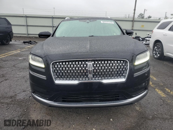 2021 Lincoln Nautilus Reserve z VIN 2LMPJ8K9XMBL07802, wystawiony jako Copart lot #57777175 z przebiegiem 27 031 mil mil oraz Szkoda całkowita • Salvage title. Historia ofert i sprzedaży dostępna na DreamBid. Obrazek 5.