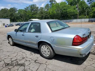 2005 Mercury Grand Marquis GS z VIN 2MEFM74W45X611002, wystawiony jako Copart lot #56645615 z przebiegiem 141 059 mil mil oraz Tytuł czysty. Historia ofert i sprzedaży dostępna na DreamBid. Obrazek 2.