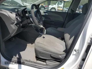 2013 Chevrolet Sonic LT with VIN 1G1JC5SH4D4164838, listed as a Copart auction lot 53611635 with 134,098 mi miles and Salvage Title. Bid and sale history available at DreamBid. Image 7.