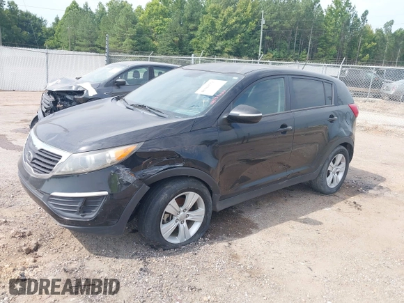 2012 Kia Sportage LX with VIN KNDPB3A28C7337795, listed as a IAAI auction lot 40118771 with 187,037 mi miles and . Bid and sale history available at DreamBid. Image 2.
