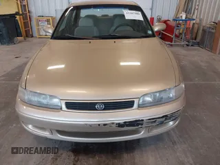1994 Mazda 626 with VIN 1YVGE22C7R5112212, listed as a IAAI auction lot 42207980 with 128,688 mi miles and . Bid and sale history available at DreamBid. Image 12.