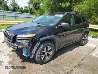 2015 Jeep Cherokee Trailhawk with VIN 1C4PJMBSXFW786655, listed as a Copart auction lot 63867045 with 156,527 mi miles and Salvage title. Bid and sale history available at DreamBid. Image 1.