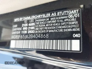2002 Mercedes-Benz E-Class with VIN WDBJF65J62B404868, listed as a IAAI auction lot 42121837 with 107,415 mi miles. Bid and sale history available at carsss.com. Image 9.