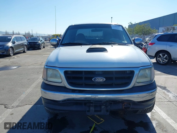 1997 Ford F-150 with VIN 1FTDX1723VKB04987, listed as a IAAI auction lot 41411405 with 234,750 mi miles and . Bid and sale history available at DreamBid. Image 12.