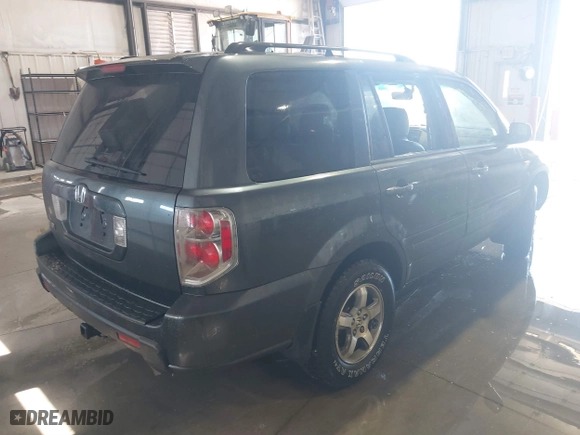 2006 Honda Pilot EX-L with RES with VIN 5FNYF28666B015764, listed as a IAAI auction lot 41703704 with 211,289 mi miles. Bid and sale history available at carsss.com. Image 4.