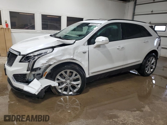 2021 Cadillac XT5 AWD Sport with VIN 1GYKNGRS5MZ142444, listed as a Copart auction lot 54502285 with 27,070 mi miles and Salvage title. Bid and sale history available at DreamBid. Image 1.