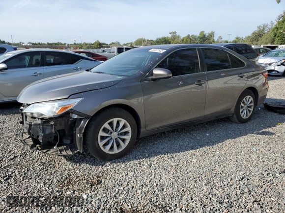 2015 Toyota Camry XLE with VIN 4T1BF1FKXFU899517, listed as a Copart auction lot 56001835 with 124,675 mi miles and Salvage Title. Bid and sale history available at DreamBid. Image 1.