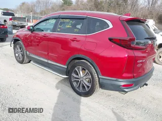 2020 Honda CR-V Touring with VIN 2HKRW2H90LH649017, listed as a IAAI auction lot 41701827 with 50,565 mi miles and . Bid and sale history available at DreamBid. Image 3.