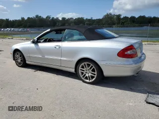 2009 Mercedes-Benz CLK-Class 3.5L with VIN WDBTK56F69T105071, listed as a Copart auction lot 77170654 with 70,688 mi miles and Salvage Title. Bid and sale history available at carsss.com. Image 2.