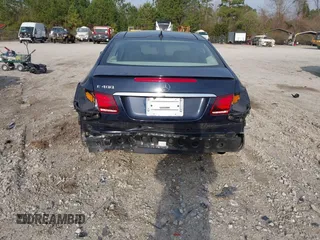2015 Mercedes-Benz E-Class E 400 with VIN WDDKJ6FB4FF307393, listed as a IAAI auction lot 41775634 with 100,928 mi miles. Bid and sale history available at carsss.com. Image 6.