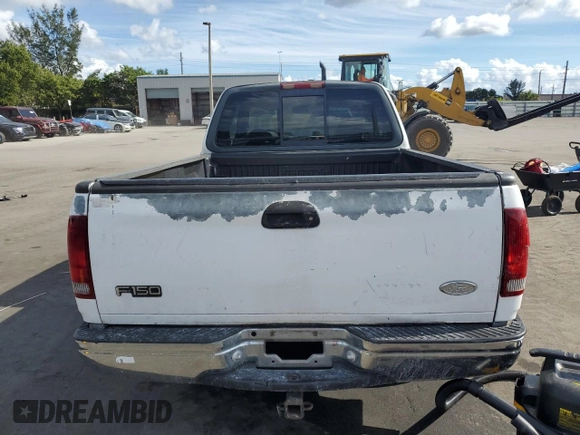 2000 Ford F-150 XL with VIN 1FTRX17W2YNB05575, listed as a Copart auction lot 86606934 with 0 mi miles and Salvage Title. Bid and sale history available at carsss.com. Image 6.