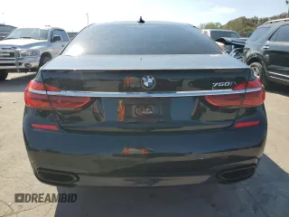 2019 BMW 7 Series 750i with VIN WBA7F0C56KGM25329, listed as a Copart auction lot 71613623 with 52,799 mi miles. Bid and sale history available at carsss.com. Image 6.