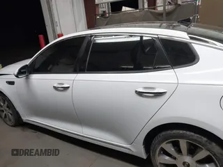 2016 Kia Optima SXL Turbo with VIN 5XXGV4L29GG075339, listed as a IAAI auction lot 42420459 with 122,294 mi miles and . Bid and sale history available at DreamBid. Image 14.