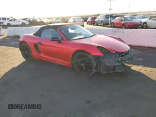 2014 Porsche Boxster with VIN WP0CA2A81ES120363, listed as a IAAI auction lot 41256837 with 109,822 mi miles and . Bid and sale history available at DreamBid. Image 1.