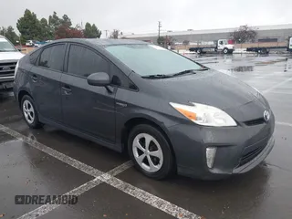 2013 Toyota Prius One with VIN JTDKN3DU2D5595628, listed as a IAAI auction lot 41208815 with 165,077 mi miles. Bid and sale history available at carsss.com. Image 1.