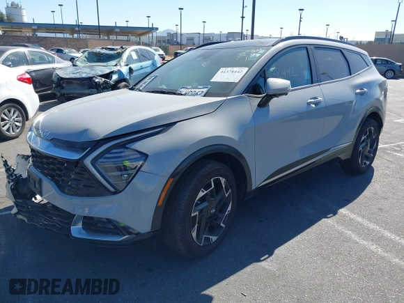 2024 Kia Sportage SX-Prestige with VIN 5XYK53DF0RG181537, listed as a IAAI auction lot 41378442 with 13,619 mi miles and . Bid and sale history available at DreamBid. Image 2.
