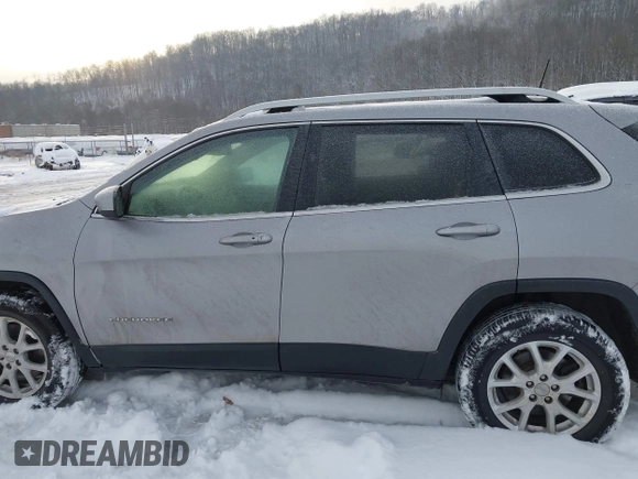 2018 Jeep Cherokee Latitude Plus with VIN 1C4PJMLB1JD502431, listed as a IAAI auction lot 41292612 with 115,839 mi miles and . Bid and sale history available at DreamBid. Image 14.