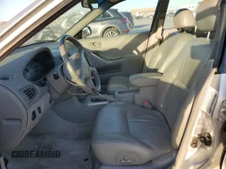 2003 Mitsubishi Galant ES z VIN 4A3AA46H13E052540, wystawiony jako Copart lot #77560984 z przebiegiem 89 173 mil mil oraz Czysty tytuł • Clean title. Historia ofert i sprzedaży dostępna na DreamBid. Obrazek 7.