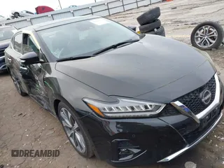 2023 Nissan Maxima Platinum z VIN 1N4AA6FV0PC509933, wystawiony jako IAAI lot #41922872 z przebiegiem 11 478 mil mil oraz . Historia ofert i sprzedaży dostępna na DreamBid. Obrazek 1.