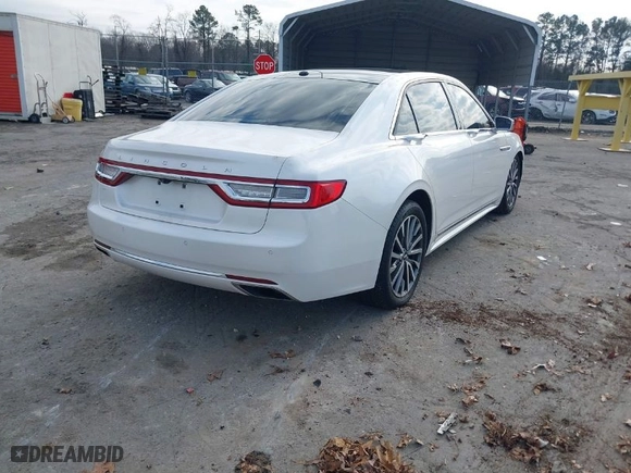 2017 Lincoln Continental Select with VIN 1LN6L9TK3H5605885, listed as a IAAI auction lot 41123925 with 142,077 mi miles. Bid and sale history available at carsss.com. Image 4.