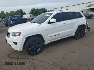 2015 Jeep Grand Cherokee Altitude with VIN 1C4RJFAG9FC954594, listed as a Copart auction lot 61002325 with 164,603 mi miles and Salvage title. Bid and sale history available at DreamBid. Image 1.