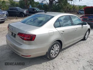 2016 Volkswagen Jetta Sedan 1.4T SE with VIN 3VWD67AJ9GM321104, listed as a IAAI auction lot 40633152 with 126,335 mi miles. Bid and sale history available at carsss.com. Image 4.
