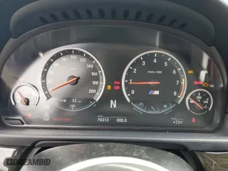 2015 BMW M5 with VIN WBSFV9C56FD594465, listed as a Copart auction lot 72085944 with 76,313 mi miles and Salvage Title. Bid and sale history available at carsss.com. Image 9.
