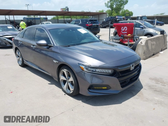 2019 Honda Accord Touring with VIN 1HGCV2F93KA013002, listed as a IAAI auction lot 42519920 with 76,841 mi miles and . Bid and sale history available at DreamBid. Image 1.