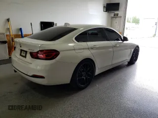 2020 BMW 4 Series 430i with VIN WBA4J1C02LCD69204, listed as a Copart auction lot 64400105 with 71,505 mi miles and Clean title. Bid and sale history available at DreamBid. Image 3.