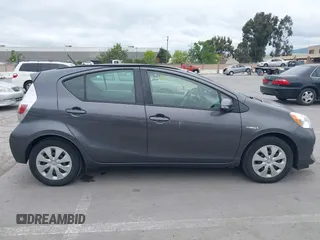 2014 Toyota Prius One with VIN JTDKDTB37E1564963, listed as a IAAI auction lot 42054591 with 186,680 mi miles and . Bid and sale history available at DreamBid. Image 13.