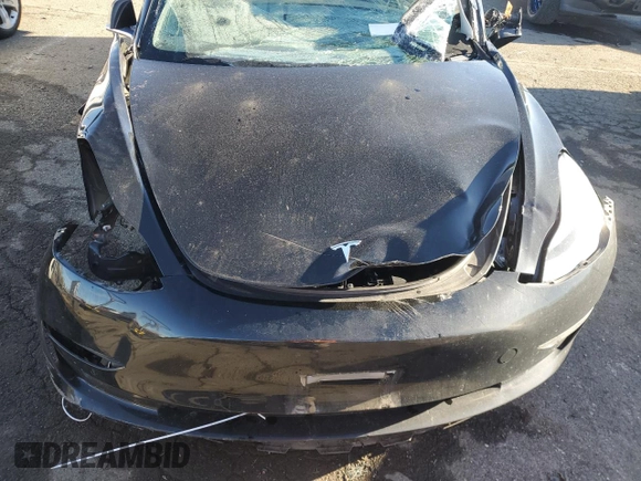 2018 Tesla Model 3 Long Range Battery with VIN 5YJ3E1EB4JF184814, listed as a Copart auction lot 88073115 with Not Provided miles and Salvage Title. Bid and sale history available at DreamBid. Image 11.