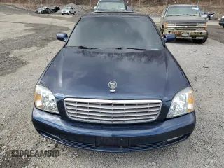 2004 Cadillac DeVille DTS z VIN 1G6KF579X4U203102, wystawiony jako Copart lot #50426955 z przebiegiem 157 290 mil mil oraz Szkody całkowita. Historia ofert i sprzedaży dostępna na DreamBid. Obrazek 5.