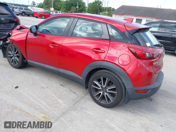 2018 Mazda CX-3 Touring with VIN JM1DKDC7XJ0318219, listed as a IAAI auction lot 41941104 with 86,186 mi miles. Bid and sale history available at carsss.com. Image 3.