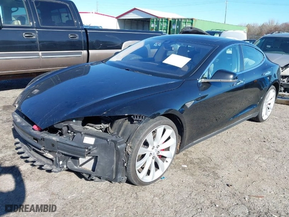 2015 Tesla Model S 85D with VIN 5YJSA4H43FF083602, listed as a IAAI auction lot 41830872 with 67,475 mi miles. Bid and sale history available at carsss.com. Image 2.