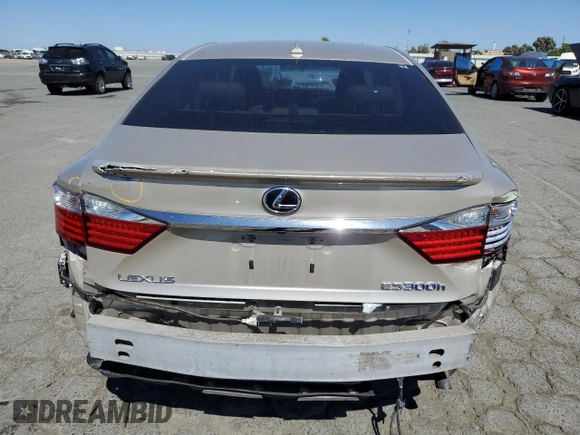 2013 Lexus ES 300h with VIN JTHBW1GG1D2011128, listed as a Copart auction lot 58246565 with 128,242 mi miles and Salvage title. Bid and sale history available at DreamBid. Image 6.