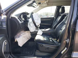 2019 Jeep Grand Cherokee Summit with VIN 1C4RJFJG0KC553199, listed as a IAAI auction lot 41352836 with 67,556 mi miles. Bid and sale history available at carsss.com. Image 5.