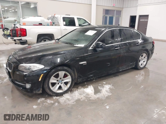 2012 BMW 5 Series 528i xDrive with VIN WBAXH5C51CDW03156, listed as a IAAI auction lot 41236722 with 189,196 mi miles and . Bid and sale history available at DreamBid. Image 2.