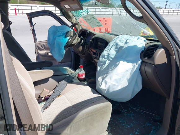 2003 Toyota Tundra SR5 with VIN 5TBRT34143S411690, listed as a IAAI auction lot 41854115 with 200,060 mi miles and . Bid and sale history available at DreamBid. Image 5.