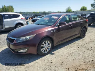 2012 Kia Optima LX with VIN 5XXGM4A79CG058892, listed as a Copart auction lot 55579085 with 153,323 mi miles and Clean Title. Bid and sale history available at carsss.com. Image 1.
