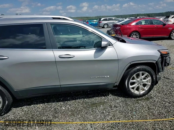2016 Jeep Cherokee Latitude z VIN 1C4PJLCS9GW161125, wystawiony jako Copart lot #61339145 z przebiegiem 244 966 mil mil oraz Szkoda całkowita • Salvage title. Historia ofert i sprzedaży dostępna na DreamBid. Obrazek 14.
