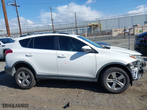 2015 Toyota RAV4 XLE with VIN JTMWFREV9FJ034992, listed as a IAAI auction lot 41922694 with 100,956 mi miles. Bid and sale history available at carsss.com. Image 14.