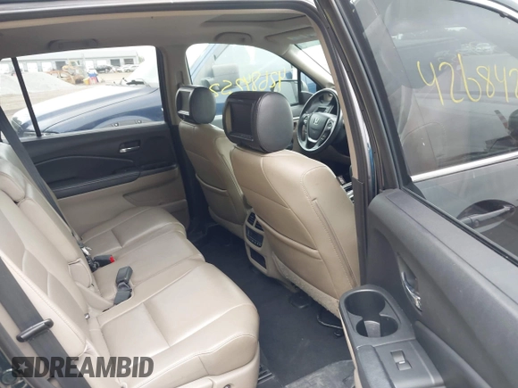 2016 Honda Pilot EX-L with VIN 5FNYF6H59GB100369, listed as a IAAI auction lot 42684252 with 146,609 mi miles and . Bid and sale history available at DreamBid. Image 8.