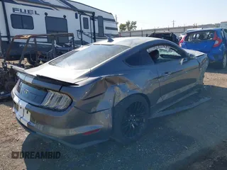 2021 Ford Mustang GT with VIN 1FA6P8CF2M5118909, listed as a IAAI auction lot 40580656 with 46,924 mi miles and . Bid and sale history available at DreamBid. Image 4.