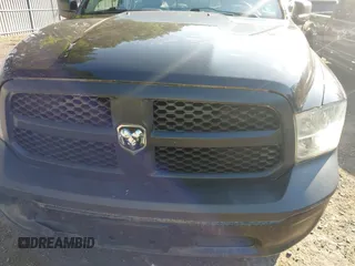 2014 Ram 1500 Tradesman z VIN 3C6JR7DG4EG324833, wystawiony jako IAAI lot #42876061 z przebiegiem 125 285 mil mil oraz . Historia ofert i sprzedaży dostępna na DreamBid. Obrazek 6.