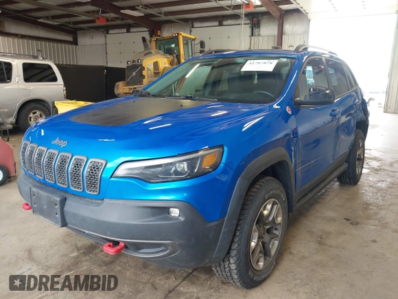 2019 Jeep Cherokee Trailhawk with VIN 1C4PJMBX0KD168097, listed as a IAAI auction lot 41787878 with 39,163 mi miles and . Bid and sale history available at DreamBid. Image 18.